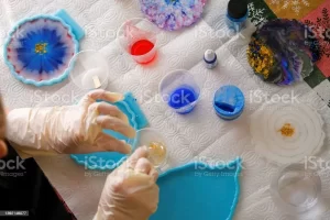 Resin art kit with liquid and blue moulds